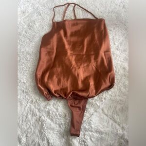 Small copper silky thong bodysuit